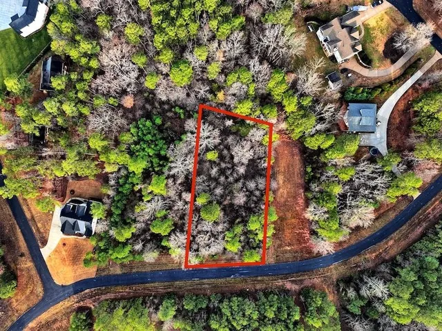 a view of a house with a street park