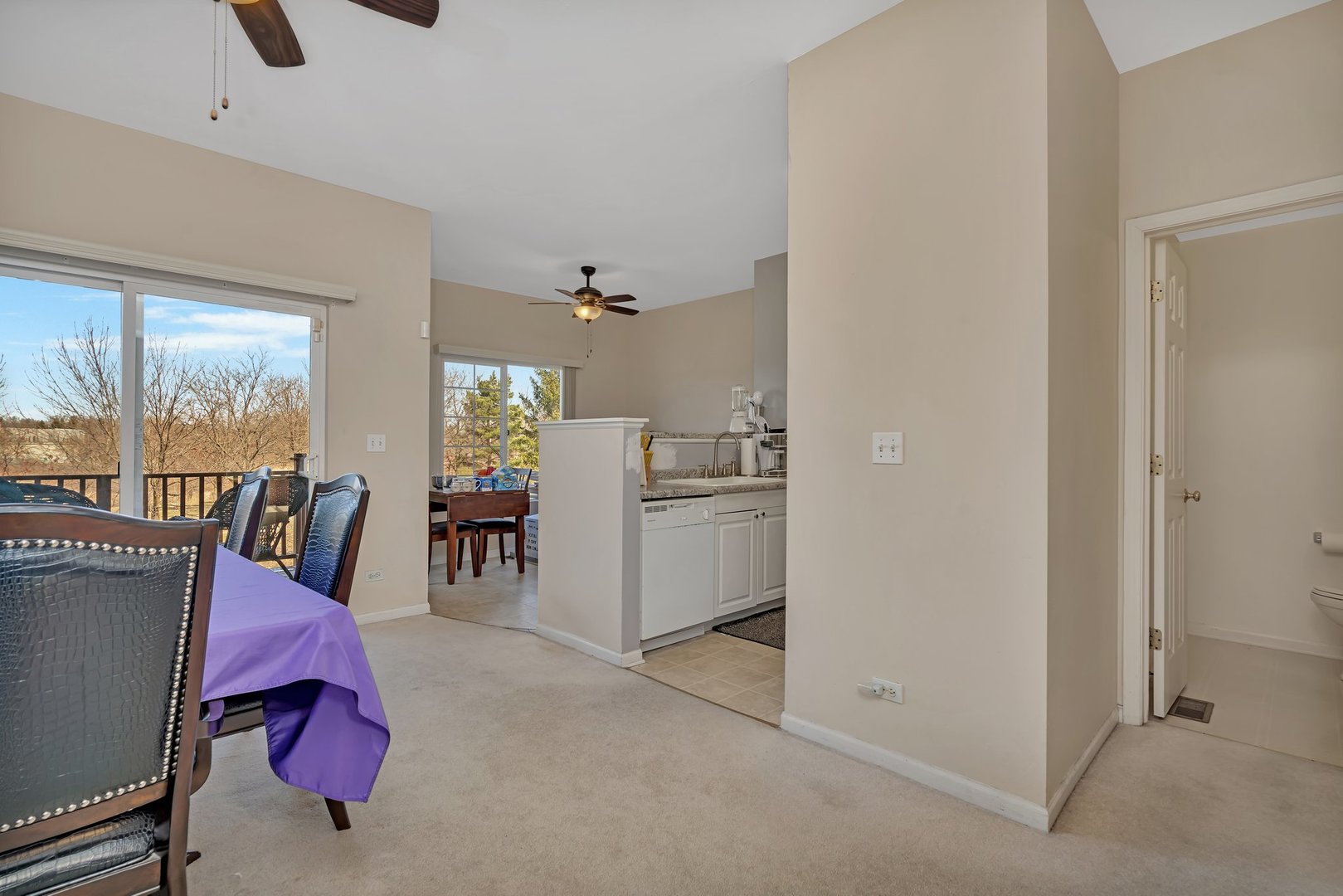 122 Enclave Circle, Unit D Bolingbrook, IL 60440 - Photo 6 of 20 a view of living room filled with furniture and window