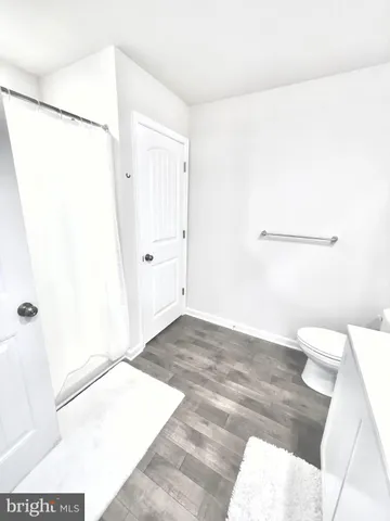 a bathroom with a sink and a shower