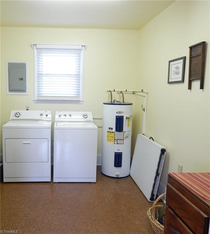2103 Collinstown Road Westfield, NC 27053 - Photo 16 of 30 Laundry room with added space for folding table or addition storage. The hot water heater was also updated by current owner!