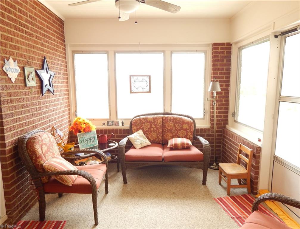 2103 Collinstown Road Westfield, NC 27053 - Photo 17 of 30 Inviting enclosed porch is the perfect place to take a break and just relax!!!