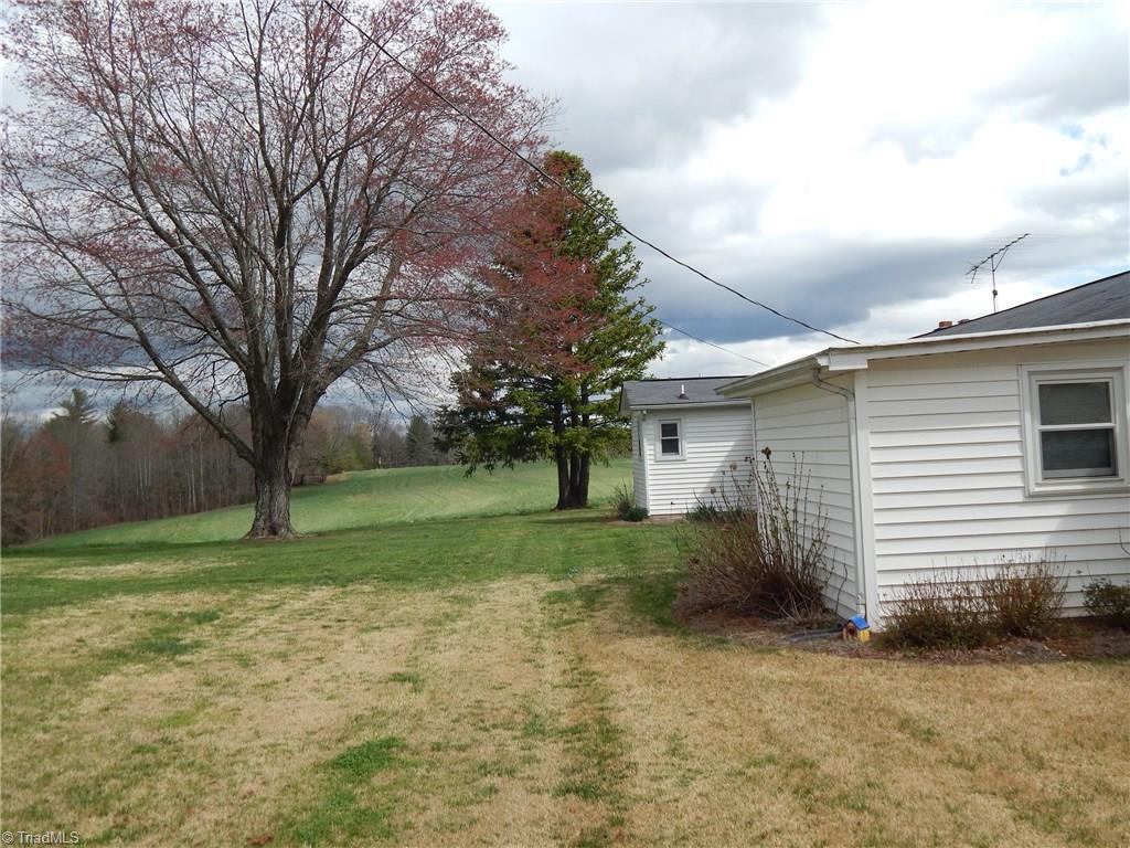 2103 Collinstown Road Westfield, NC 27053 - Photo 24 of 30 Beautiful level back yard for the children or pets to play!