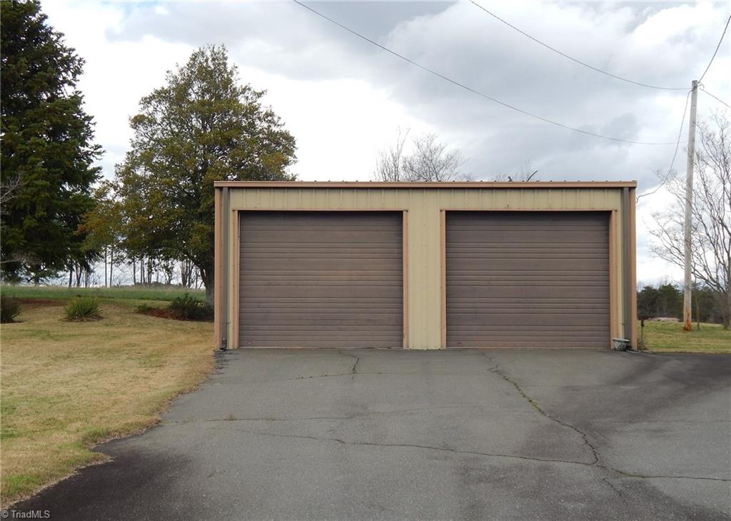 2103 Collinstown Road Westfield, NC 27053 - Photo 25 of 30 30' x 24' Metal Garage/Shop, power is currently not connected but has separate meter box!!