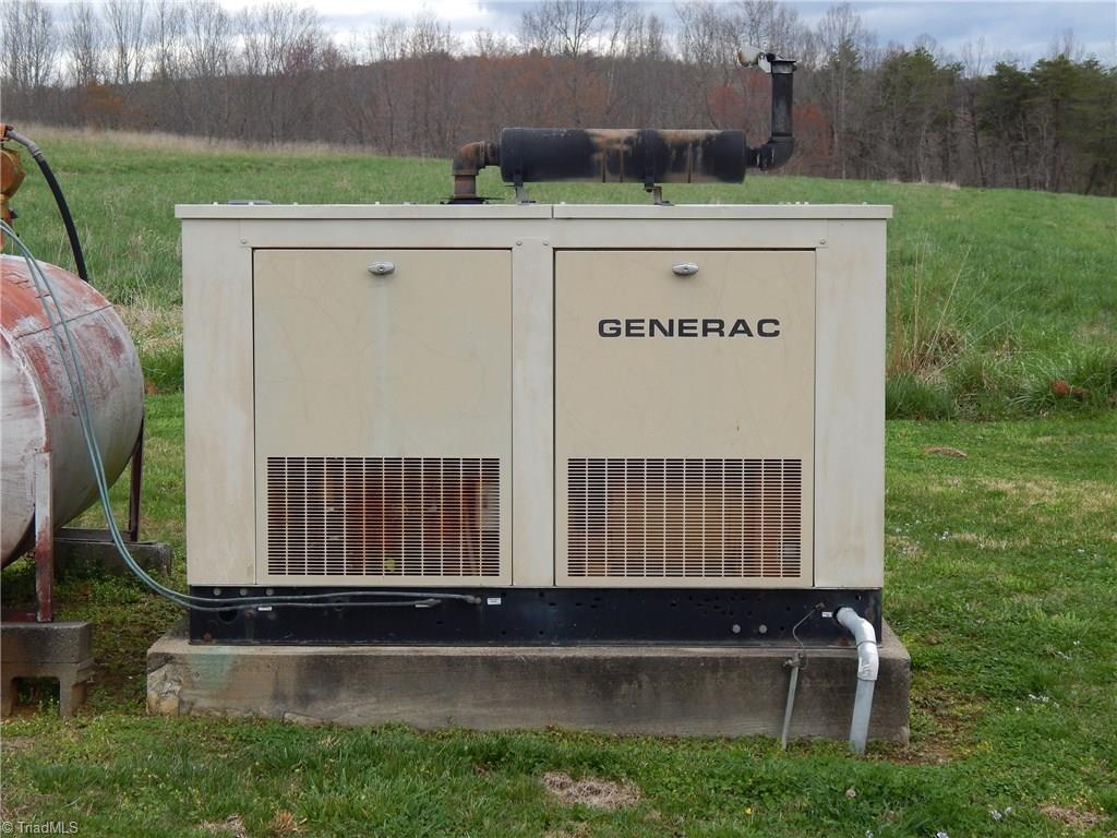 2103 Collinstown Road Westfield, NC 27053 - Photo 27 of 30 Rest assured, it will not matter if you loose power! Per seller, this Generac whole house generator is large enough to run the entire home when power goes out and it automatically connects for you!!!
