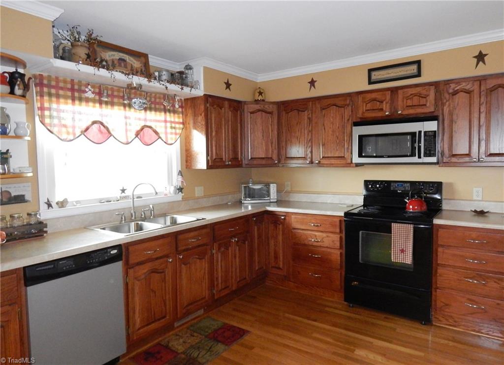 2103 Collinstown Road Westfield, NC 27053 - Photo 6 of 30 Love this kitchen, so much room to prepare meals and gather with family & friends!