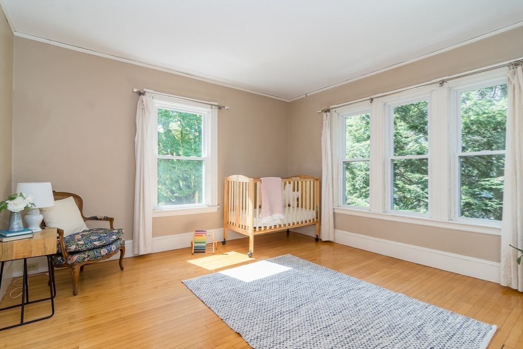 224 Bacon Street Natick, MA 01760 - Photo 17 of 28 a living room with furniture and a window