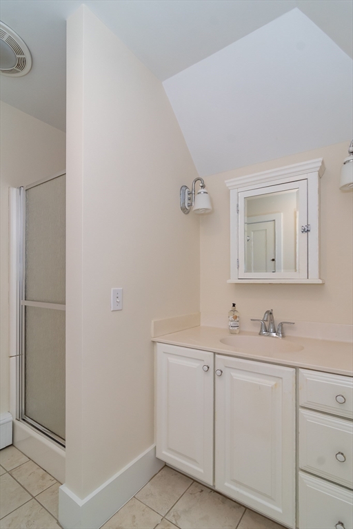 224 Bacon Street Natick, MA 01760 - Photo 22 of 28 a bathroom with a sink and a mirror