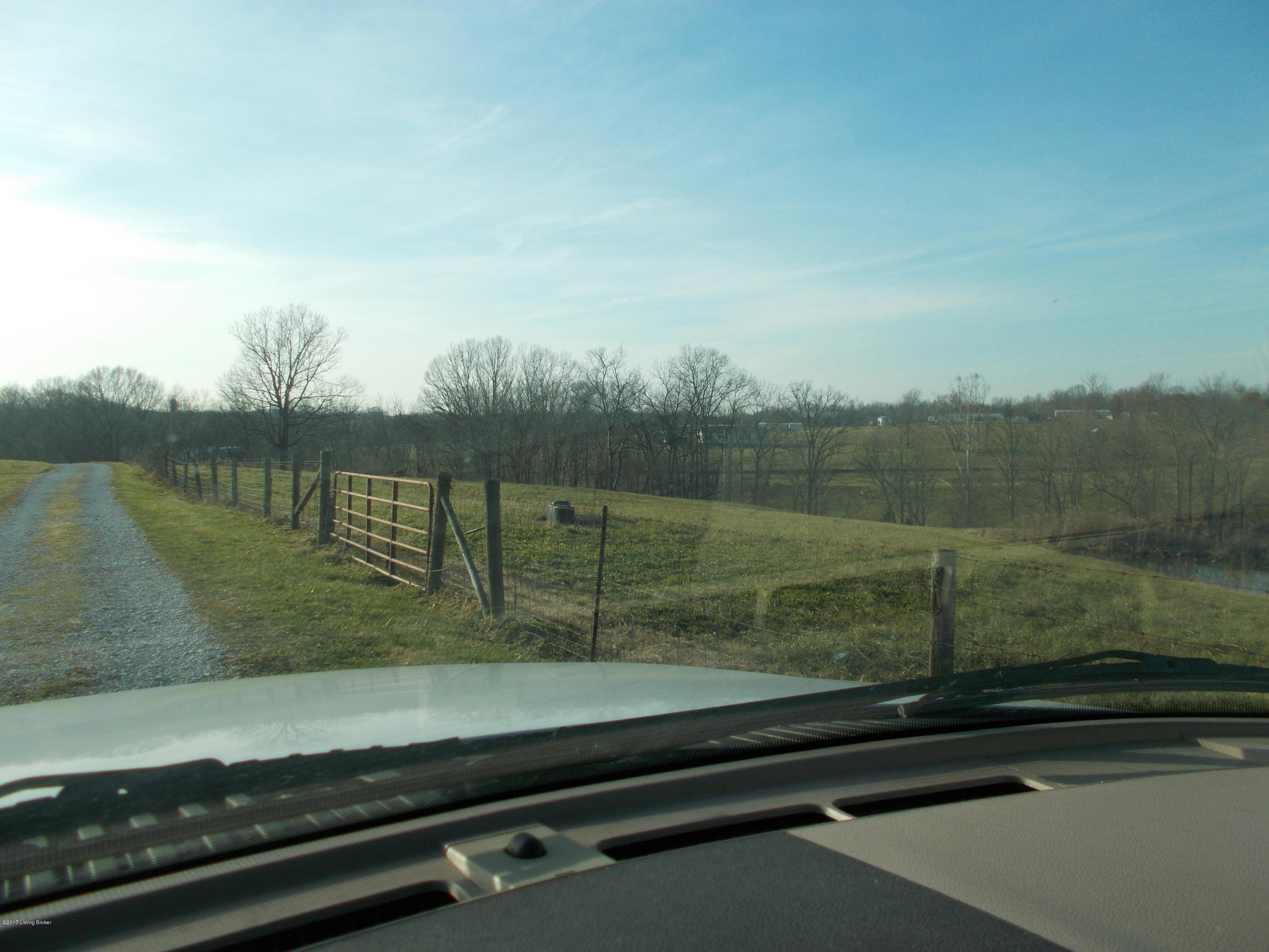 4530 Lagrange Road Smithfield, KY 40068 - Photo 18 of 18 Cattle waterer in the pasture near the barns and the pond below. One on each side of the driveway.