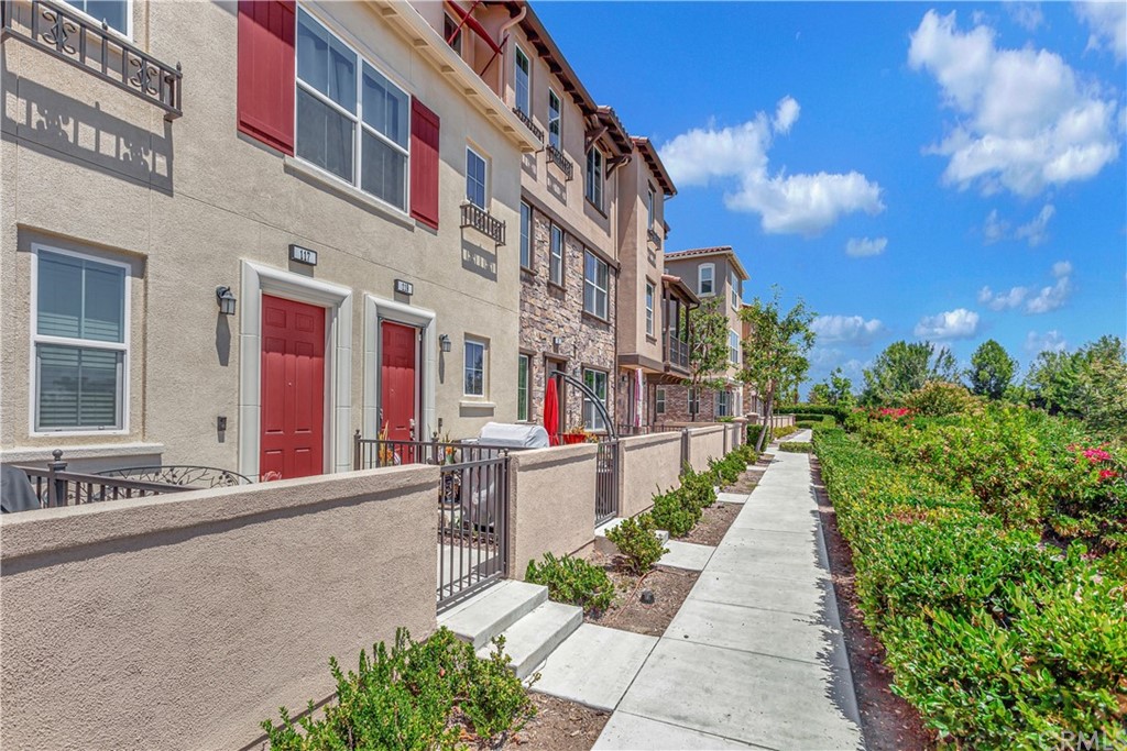 117 Aliso Ridge Loop Mission Viejo, CA 92691 - Photo 1 of 1 a view of a building with a yard