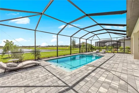 a view of a swimming pool with a porch