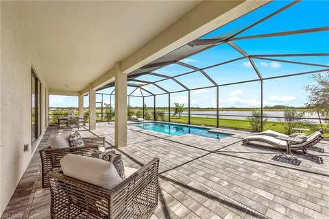 a view of swimming pool with a balcony