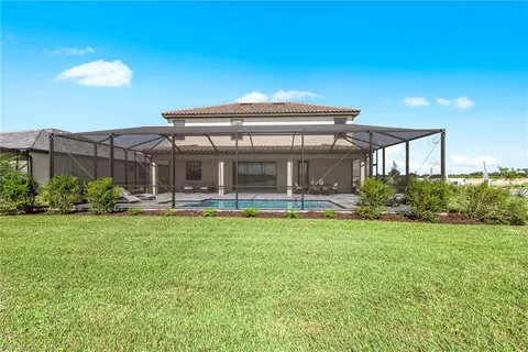 a view of a lake and a yard