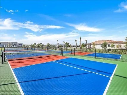 a view of swimming pool from a balcony
