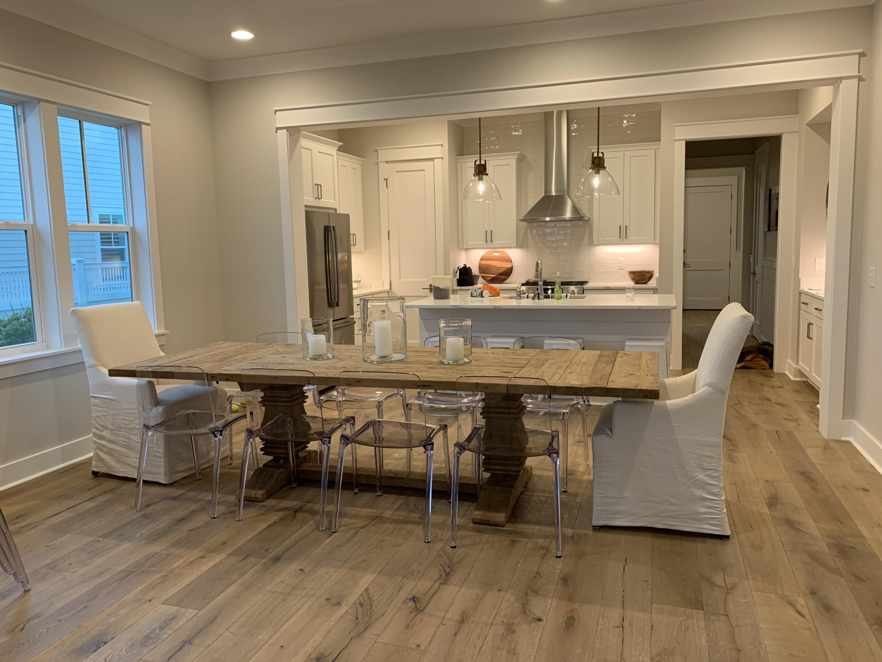 82 Sidecamp Road Watersound, FL 32461 - Photo 31 of 32 a dining room with furniture and wooden floor