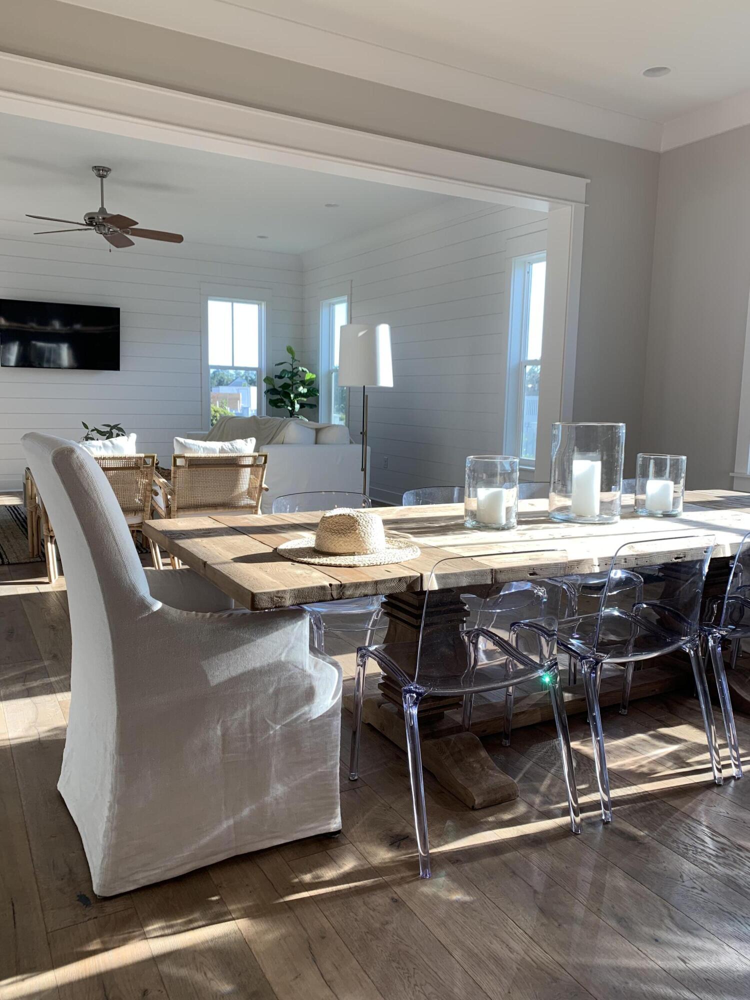 82 Sidecamp Road Watersound, FL 32461 - Photo 32 of 32 a dining room with furniture and wooden floor