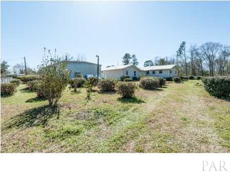 150 Balboa Road Cantonment, FL 32533 - Photo 3 of 25 A view of the rear of the home from the side/rear angle