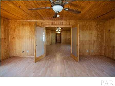 150 Balboa Road Cantonment, FL 32533 - Photo 5 of 25 Double doors lead you into the rest of the home, so inviting as you stand in the Foyer