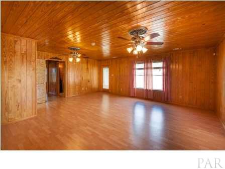 150 Balboa Road Cantonment, FL 32533 - Photo 6 of 25 As you leave the Foyer you walk into the spacius Living Room