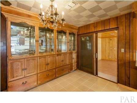 150 Balboa Road Cantonment, FL 32533 - Photo 9 of 25 Built in China Cabinets that are just off of the Kitchen, with access to the Formal Dining Room
