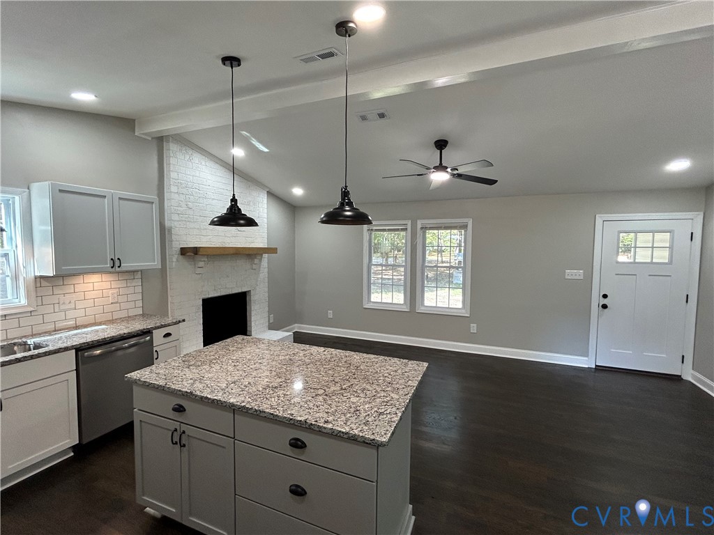 1024 Mill Road King William, VA 23086 - Photo 11 of 35 a kitchen with a stove and a fireplace