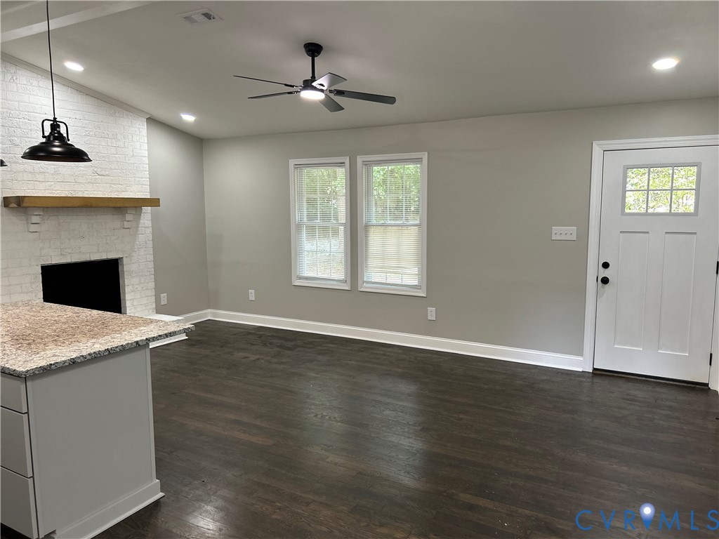 1024 Mill Road King William, VA 23086 - Photo 12 of 35 a view of an empty room with wooden floor and a window