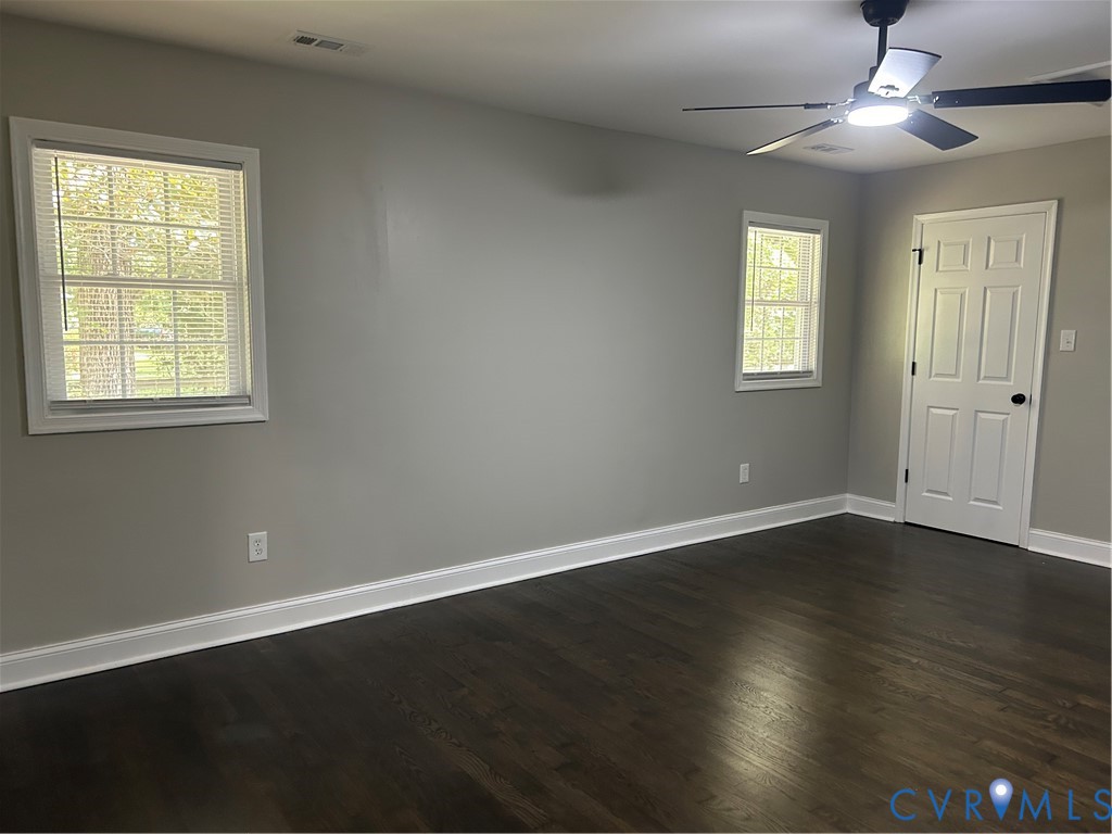 1024 Mill Road King William, VA 23086 - Photo 17 of 35 a view of an empty room with wooden floor and a window