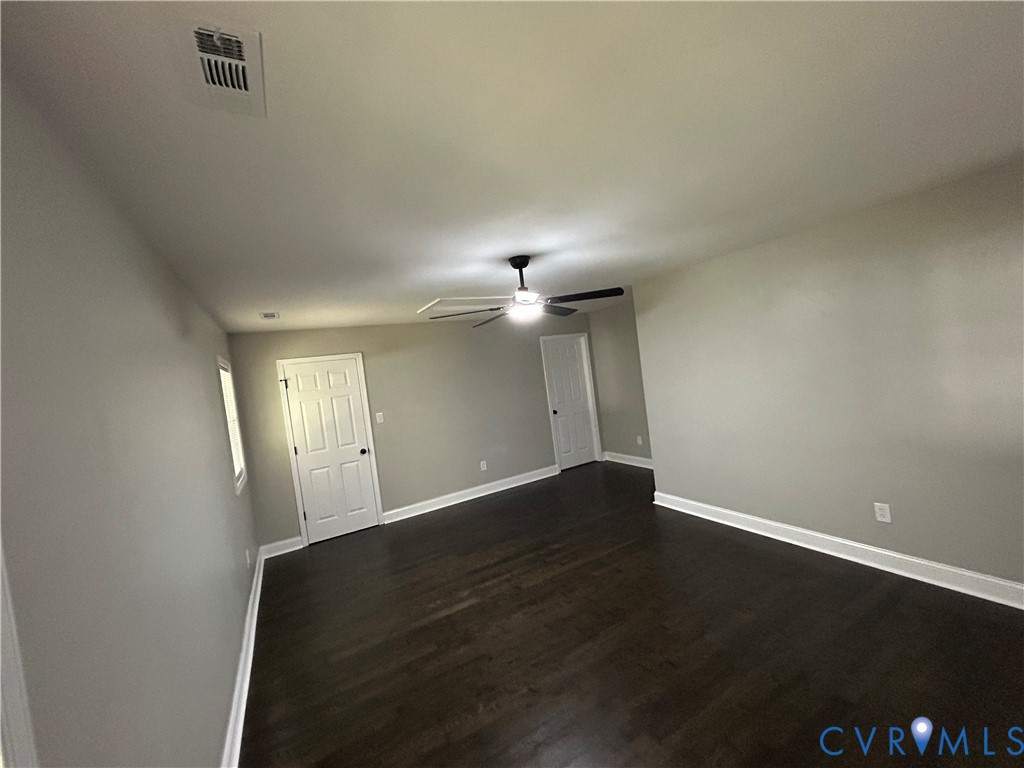 1024 Mill Road King William, VA 23086 - Photo 18 of 35 an empty room with wooden floor and windows
