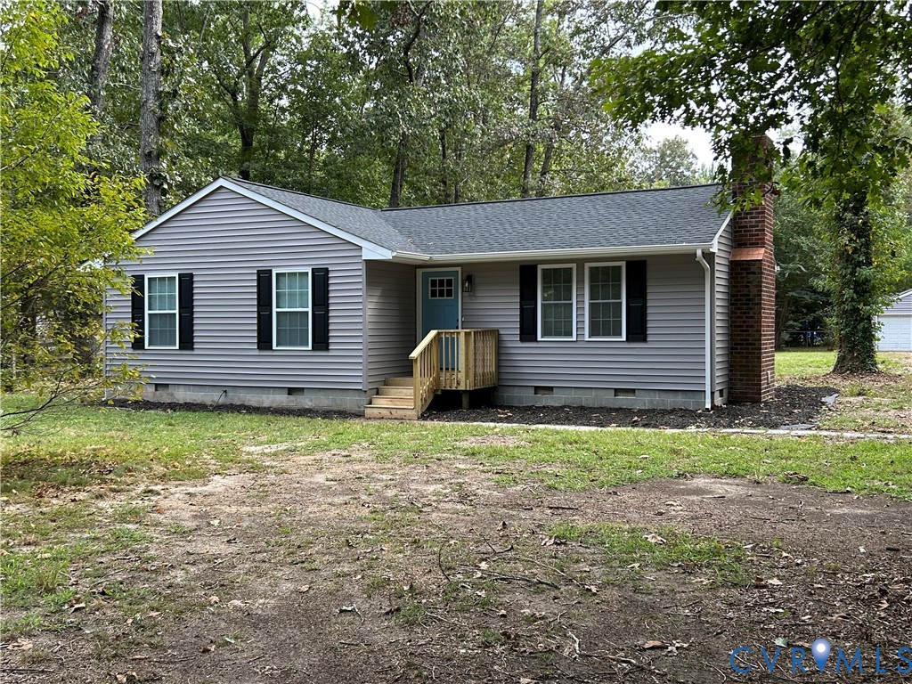 1024 Mill Road King William, VA 23086 - Photo 2 of 35 a front view of a house with garden