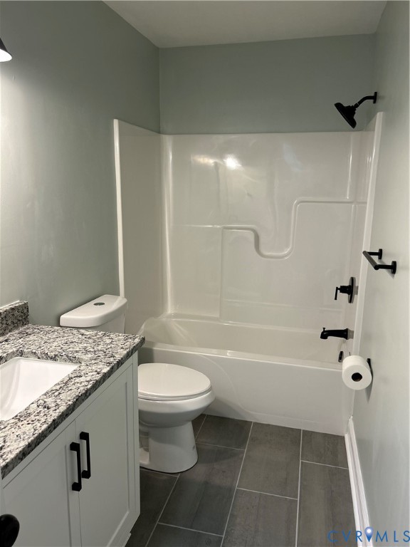 1024 Mill Road King William, VA 23086 - Photo 24 of 35 a bathroom with a granite countertop sink toilet and shower