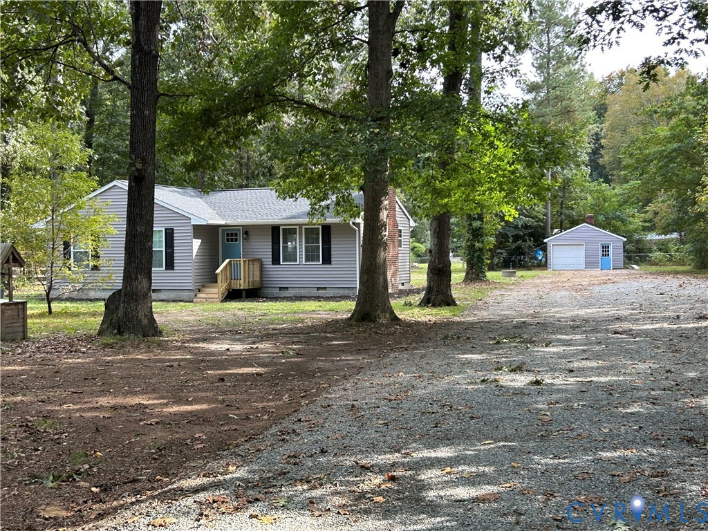 1024 Mill Road King William, VA 23086 - Photo 4 of 35 a view of a house with a yard