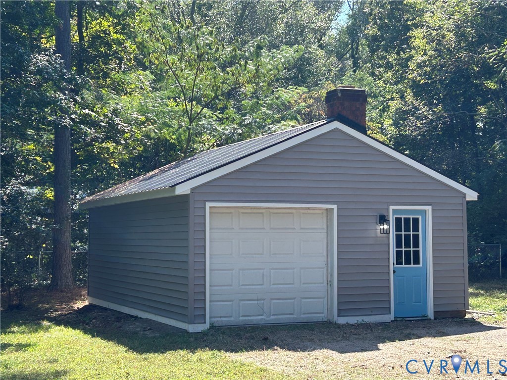 1024 Mill Road King William, VA 23086 - Photo 5 of 35 a front view of a house with a yard