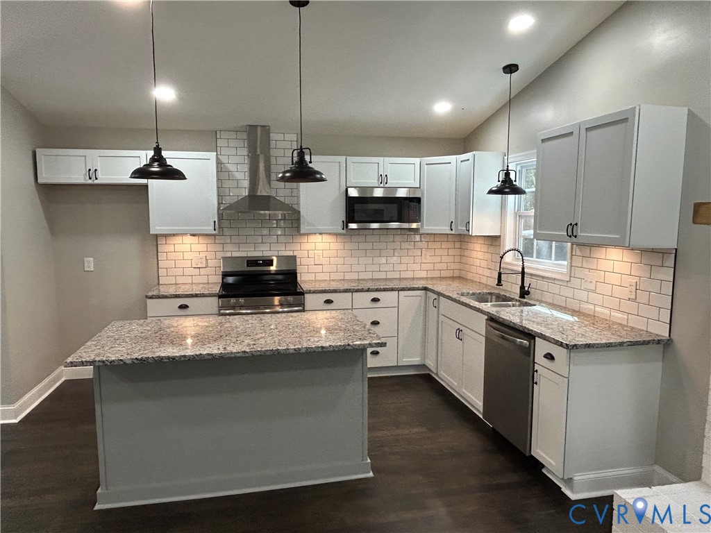 1024 Mill Road King William, VA 23086 - Photo 7 of 35 a large kitchen with stainless steel appliances kitchen island a large island in the center