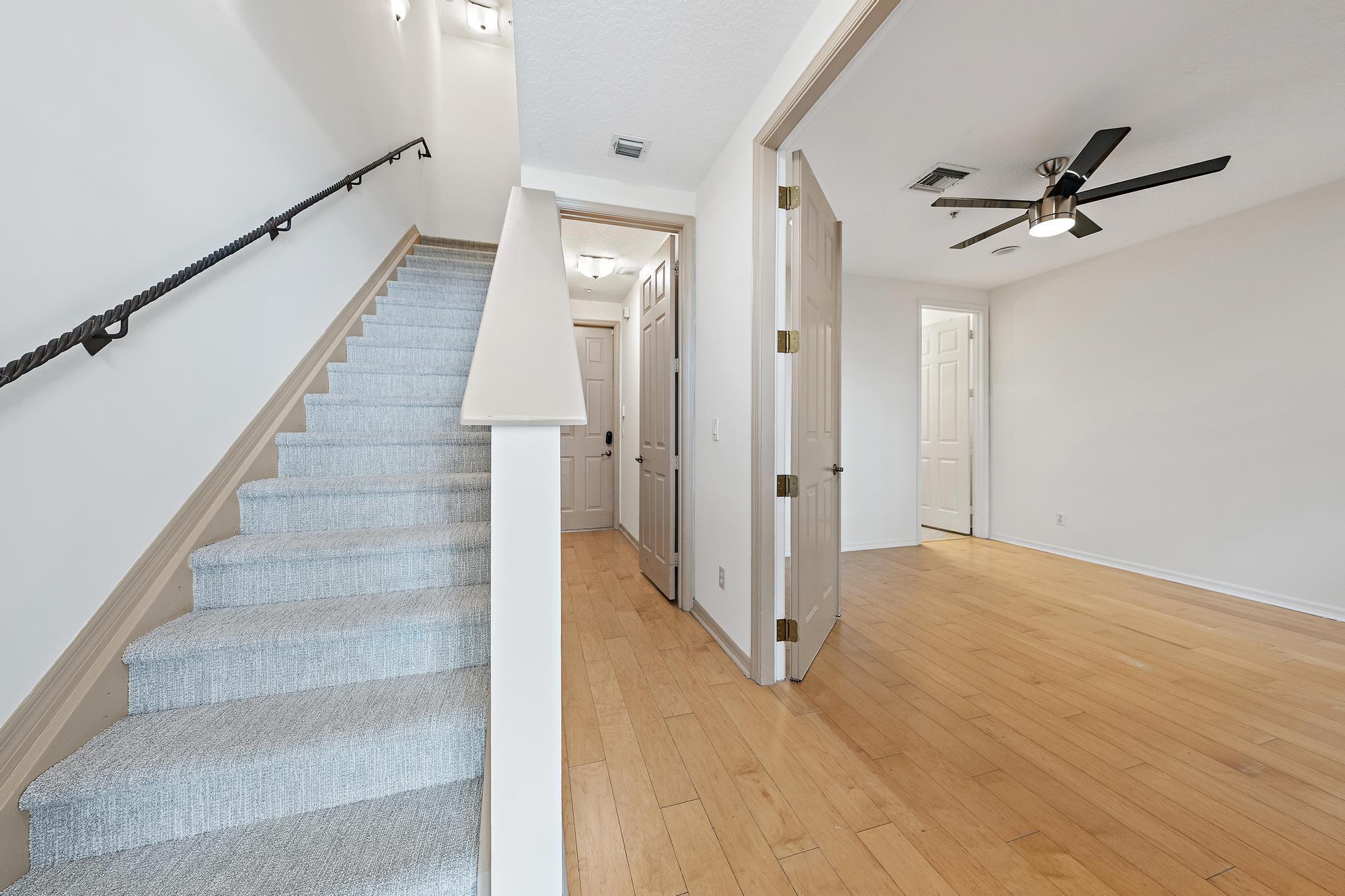 4316 Blowing Point Place Jupiter, FL 33458 - Photo 13 of 45 Stairway & Bedroom
