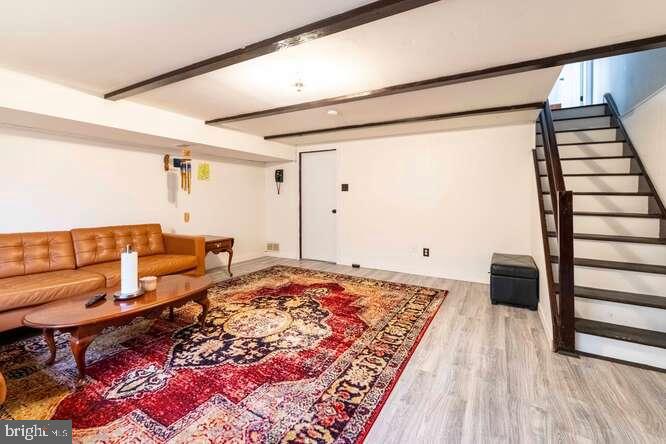 7521 Valley Avenue Philadelphia, PA 19128 - Photo 6 of 14 a living room with furniture and a rug