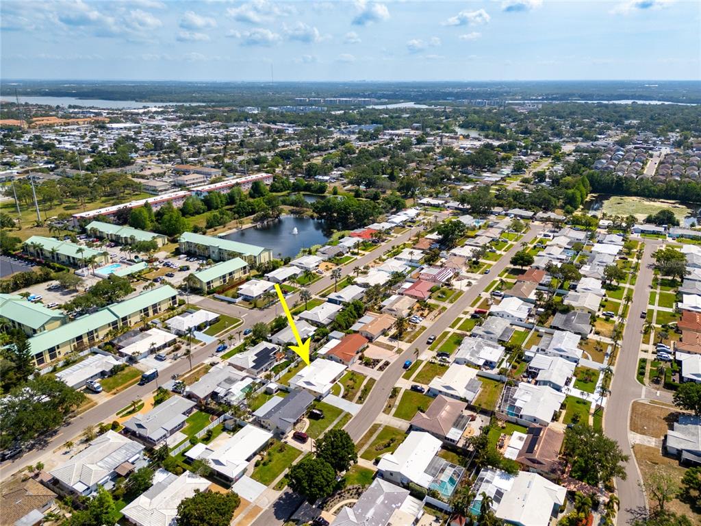 11225 59th Avenue Seminole, FL 33772 - Photo 14 of 15 an aerial view of a city with lots of residential buildings