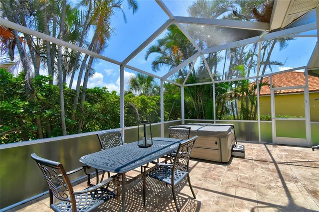 a view of a chairs and table in the patio
