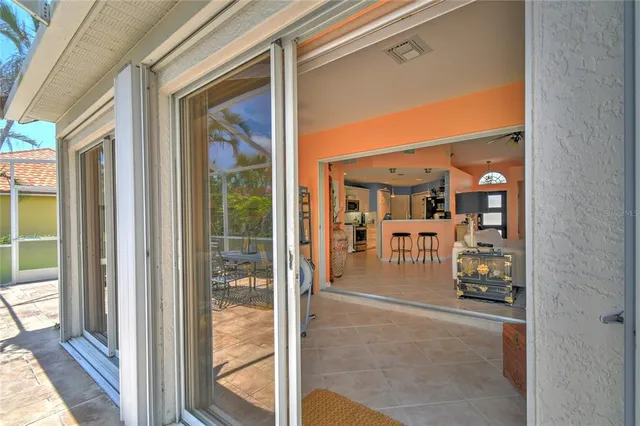 a view of a glass door and outdoor space