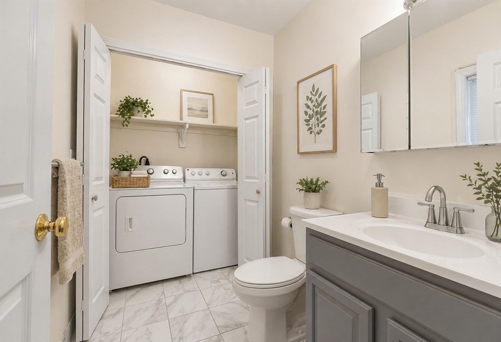 403-405 Reedsdale Road Milton, MA 02186 - Photo 11 of 21 a view of bathroom with a sink toilet and vanity