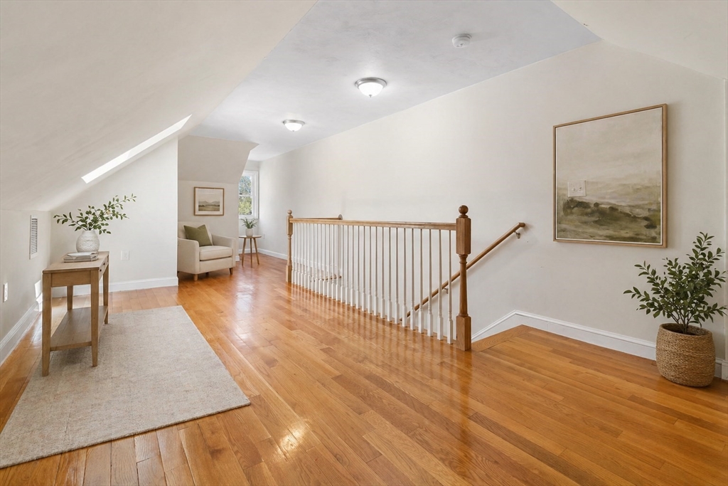 403-405 Reedsdale Road Milton, MA 02186 - Photo 13 of 21 a view of livingroom with furniture and wooden floor