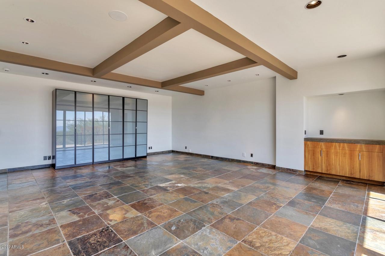 5401 East Wonderview Road Phoenix, AZ 85018 - Photo 51 of 58 Downstairs great room with built in stor