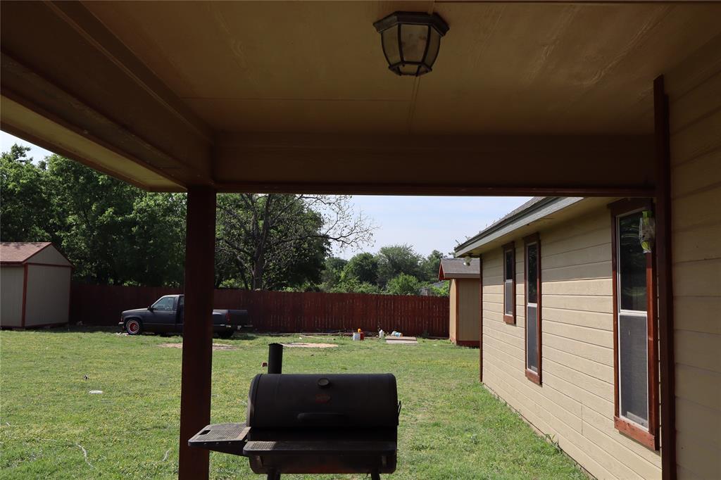 902 El Campo Drive Rio Vista, TX 76093 - Photo 11 of 11 a view of backyard with seating space