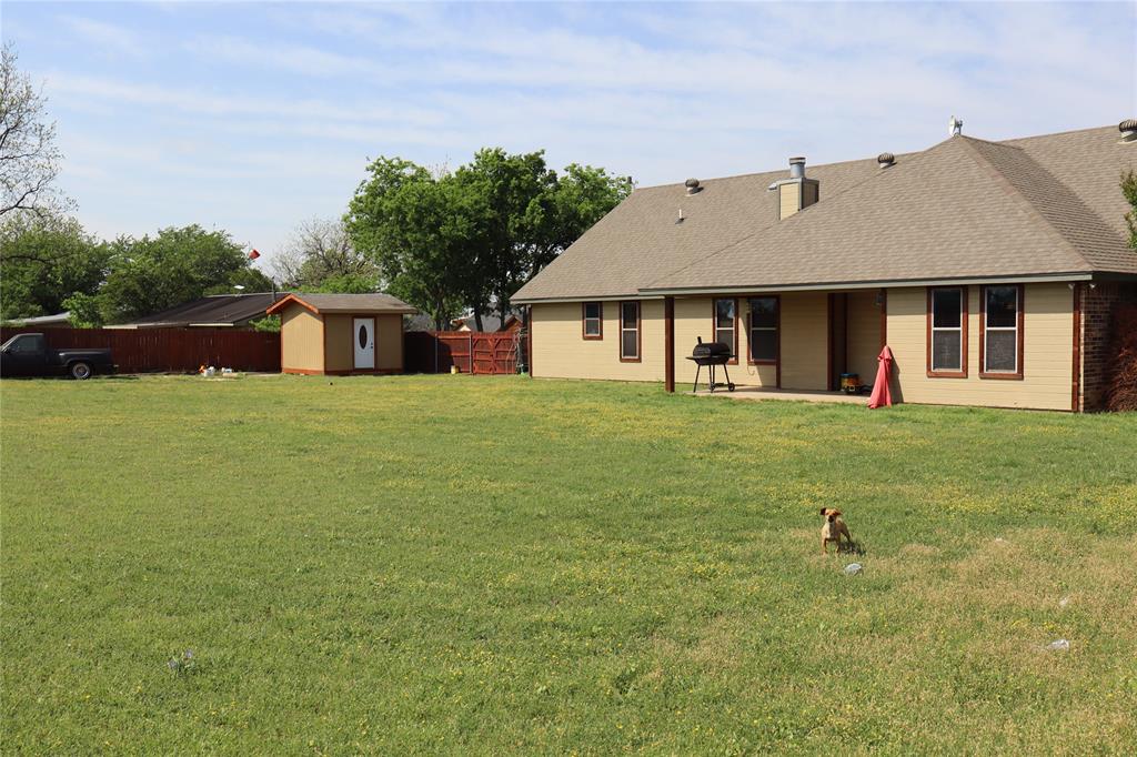 902 El Campo Drive Rio Vista, TX 76093 - Photo 5 of 11 a house view with a garden space