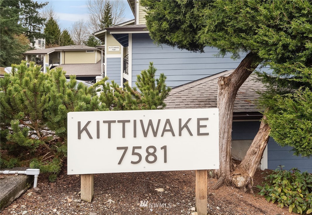 7581 Old Redmond Road, Unit 1 Redmond, WA 98052 - Photo 2 of 19 a sign that is on the side of a building