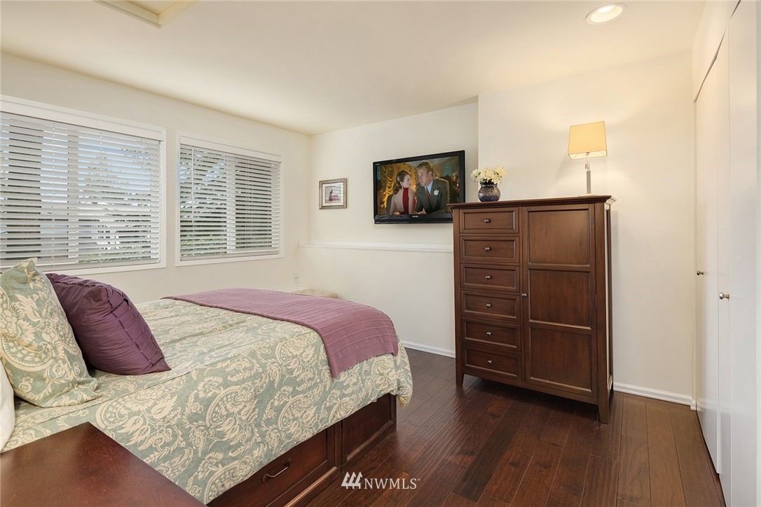 7581 Old Redmond Road, Unit 1 Redmond, WA 98052 - Photo 11 of 19 a bedroom with a bed and a television