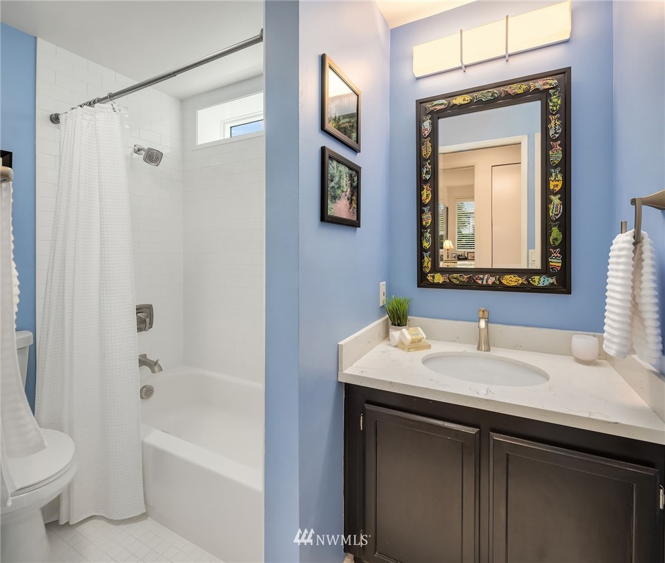 7581 Old Redmond Road, Unit 1 Redmond, WA 98052 - Photo 17 of 19 a bathroom with a sink and a mirror