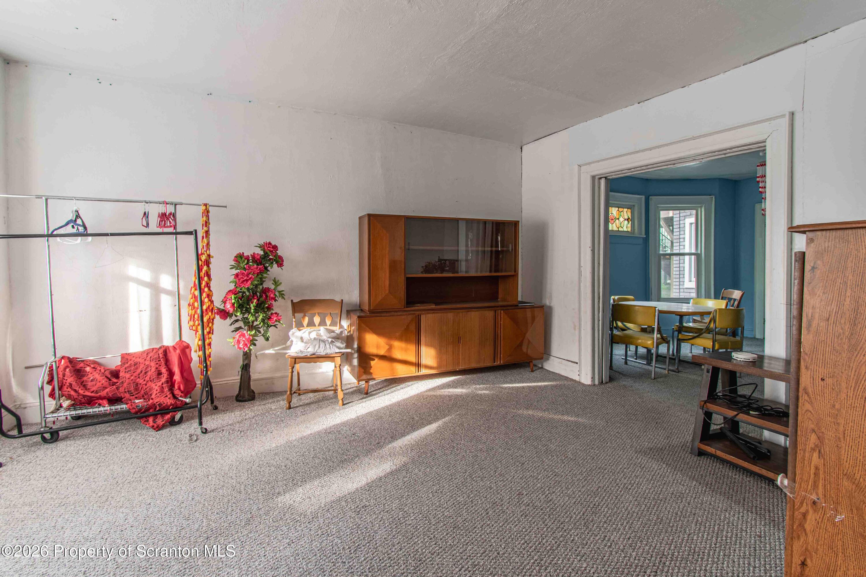 844 Monroe Avenue, Unit 844 Scranton, PA 18510 - Photo 2 of 15 a view of a livingroom with furniture and a couch
