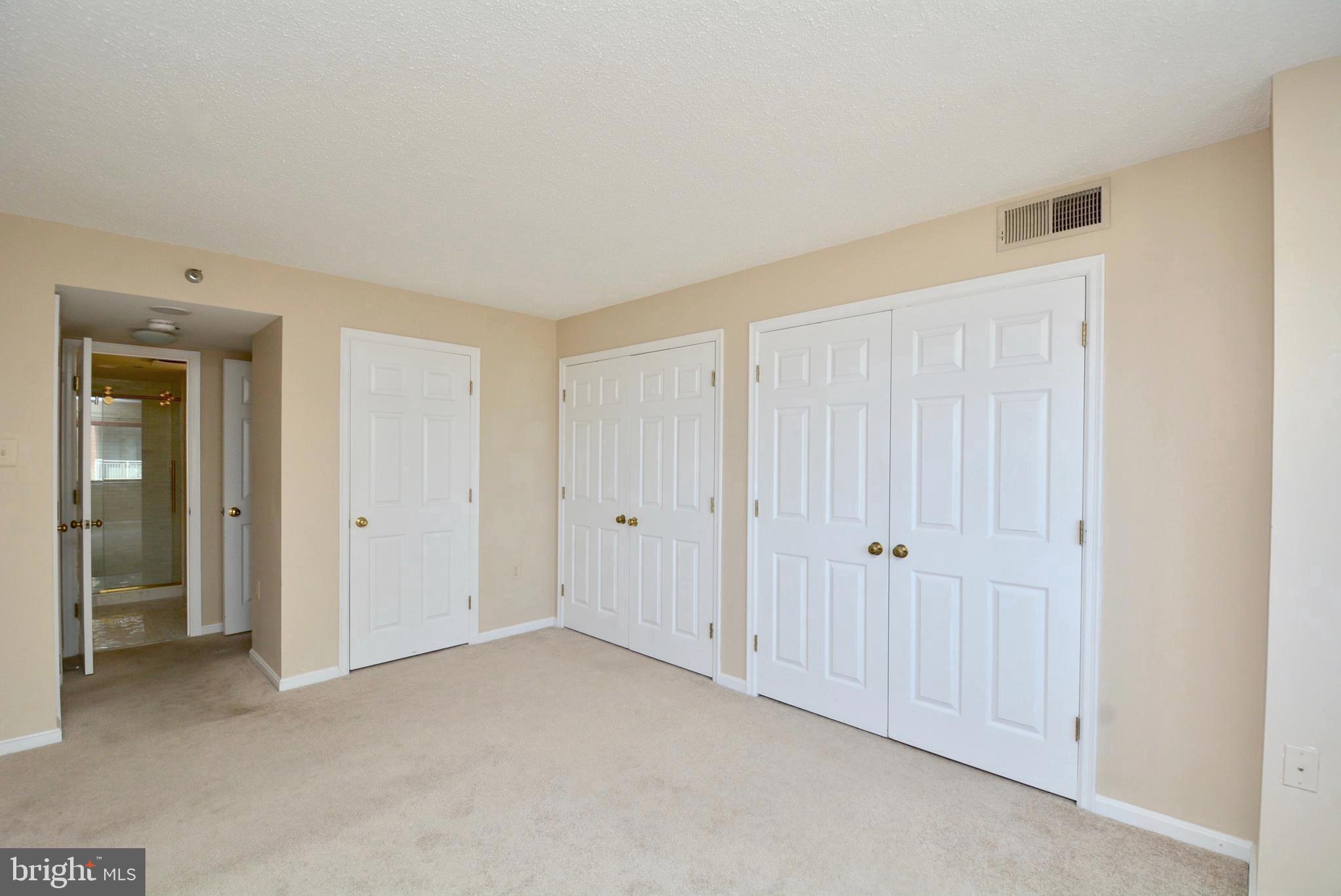 1301 North Courthouse Road, Unit 1512 Arlington, VA 22201 - Photo 22 of 37 Primary BR with 3 spacious closets