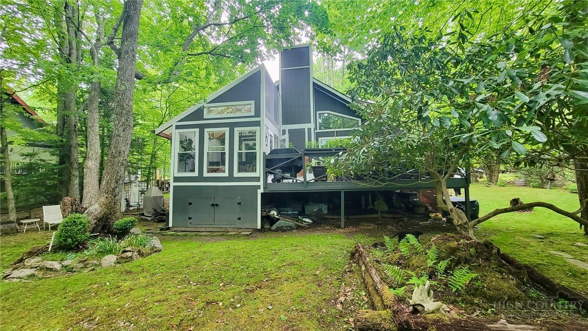 111 Locust Ridge Road Beech Mountain, NC 28604 - Photo 17 of 21 front view of a house with a yard