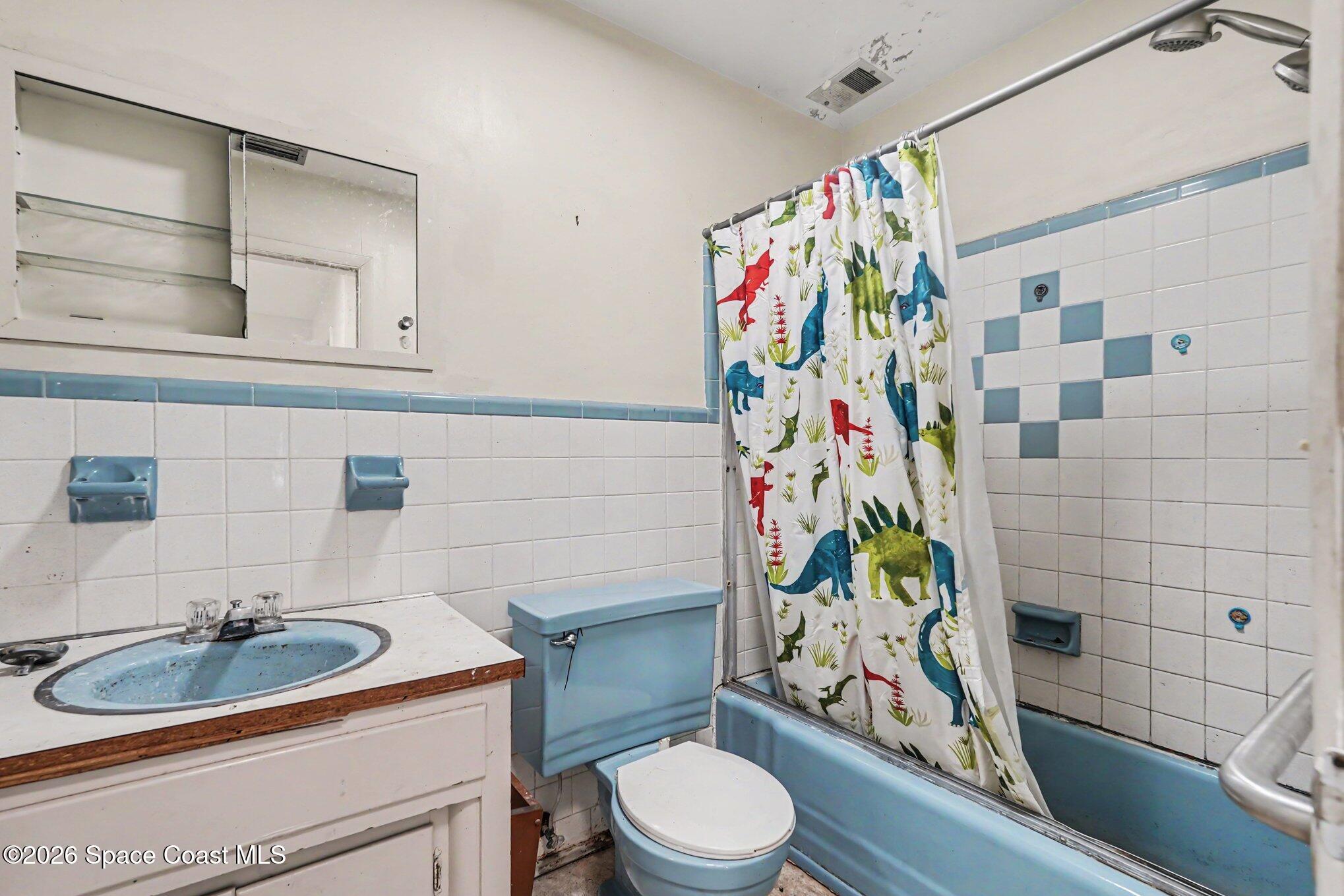 1406 Northeast Tropicana Road Palm Bay, FL 32905 - Photo 17 of 37 021_file_3476