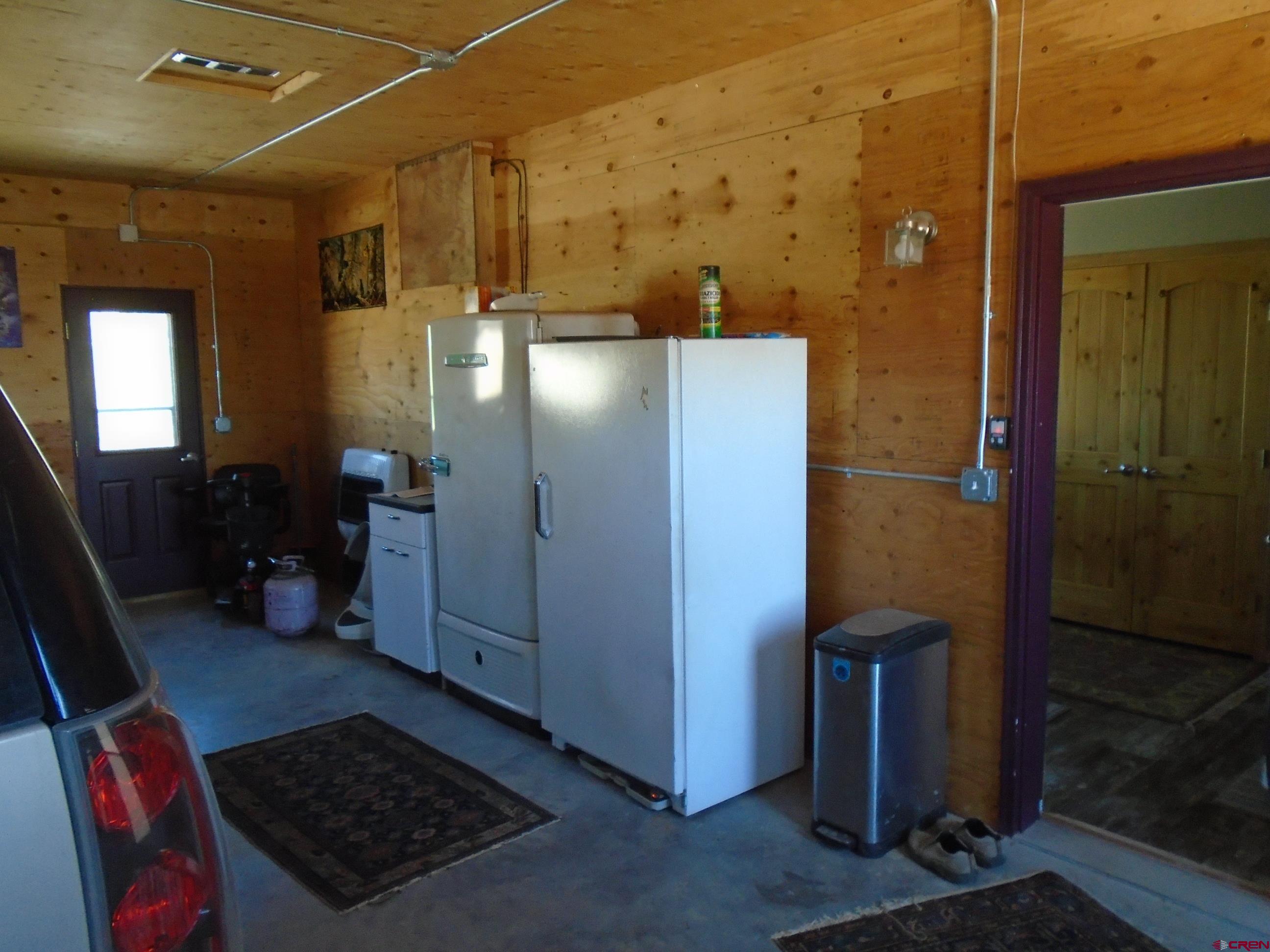 23041 T Road Cedaredge, CO 81413 - Photo 20 of 28 a view of a storage & utility room